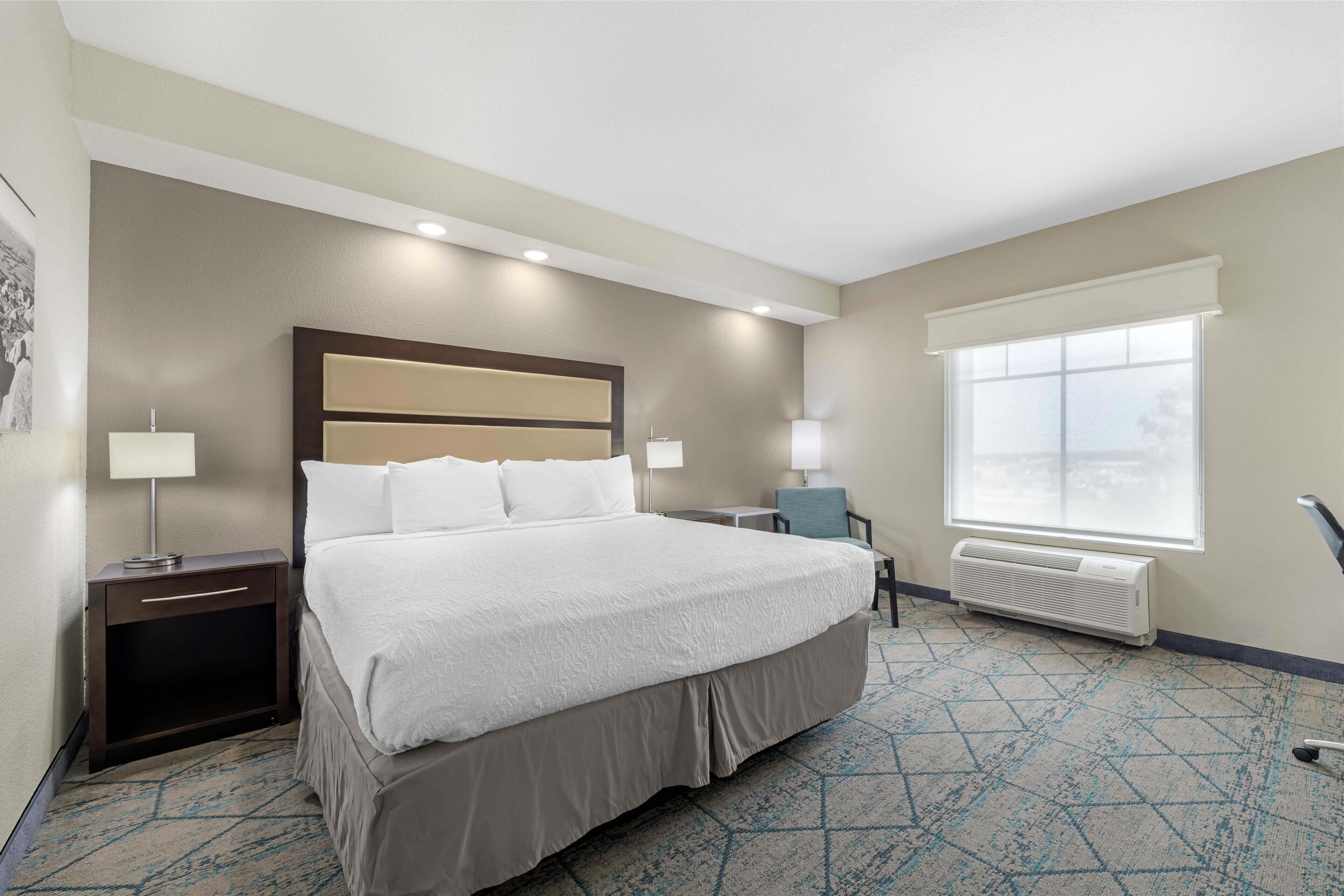 standard room, 1 king bed, non smoking, refrigerator & microwave | 1 bedroom, desk, laptop workspace, iron/ironing board