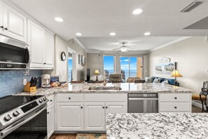 Condo, Multiple Beds, Private Pool | Private kitchen | Fridge, microwave, oven, stovetop - Treasure Island 0810 (Panama City Beach)