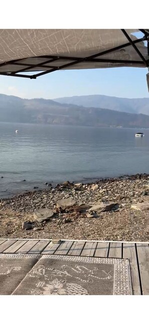 On the beach, sun-loungers, beach towels