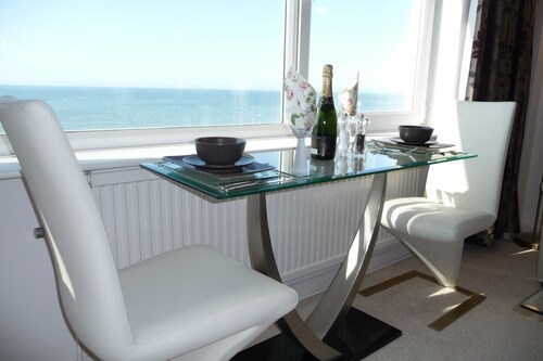 With spectacular sea views the flat is literally across the road from the Beach.