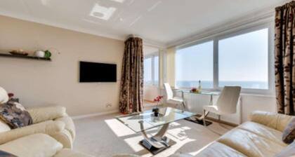 With spectacular sea views the flat is literally across the road from the Beach.