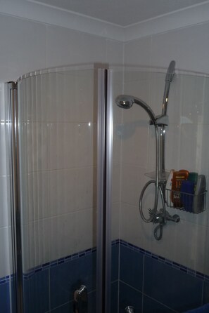 Combined shower/tub, hair dryer, towels, soap