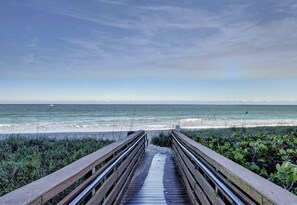 On the beach, sun loungers, beach towels