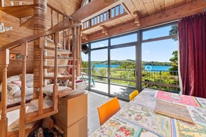 Dining - A character 1960 Scandinavian holiday home - great for families and pets. (Rotorua)