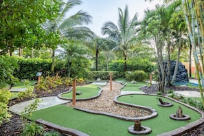 Play a round amidst lush tropical gardens and challenging obstacles.