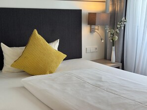 Superior-enkeltværelse | Premium-sengetøj, pengeskab på værelset, individuelt design