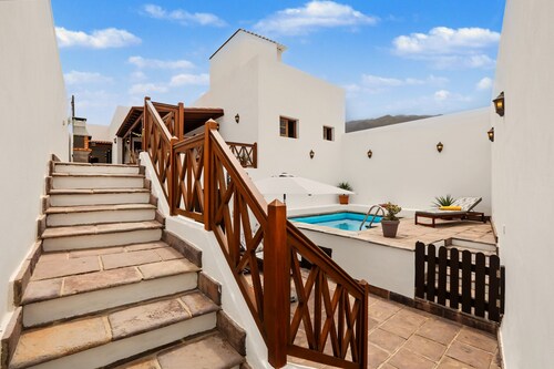 Casa de vacaciones "Rincón de Daute" con vistas al mar y a la montaña, piscina, Wi-Fi y terraza