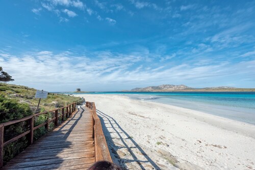 Maison de vacances "Pergola 708" à quelques mètres de la plage avec climatisation et terrasse privée