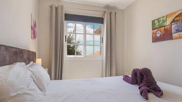 1 dormitorio, tabla de planchar con plancha, wifi gratis y ropa de cama