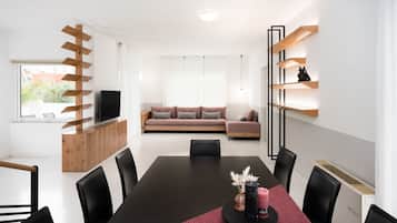 Villa | Living area | 42-inch Smart TV with satellite channels, TV, Netflix