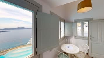 Deluxe Room, Sea View | Living area | 50-inch Smart TV with digital channels, TV