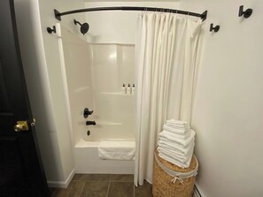 Bathtub, hair dryer, towels, soap - The Windfall, a Luxury Alaskan Vacation Home (Juneau)