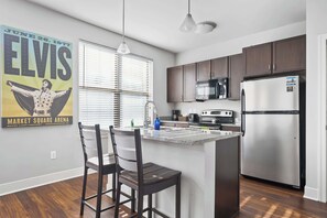 Fridge, microwave, oven, stovetop - Perfect Location! Cozy Corner Condo + Free Parking (Indianapolis)