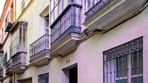 A row of buildings with balconies and barred windows, suggesting a historic or residential area. - Genteel Home Palacio Abades Terrace II (Sevilla)