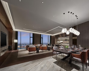 A modern hotel room with a panoramic city view, a dining area with a long table, and a cozy seating area with sofas and chairs. - Hyatt Regency Shanghai Songjiang (Shanghai)