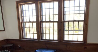 This cozy apartment is situated on 20 acres with a distant view of Sebago Lake.