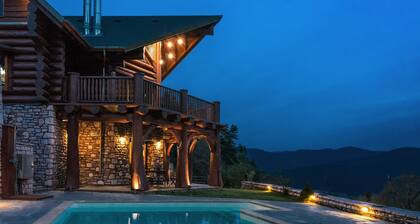 Luxury secluded mountain log chalet with pool (shared)