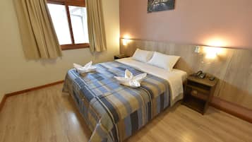 Habitación Deluxe | Minibar, escritorio, wifi gratis y ropa de cama