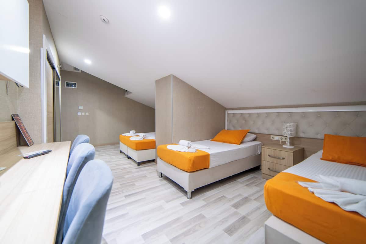 Family Room | 2 bedrooms, in-room safe, individually decorated, individually furnished