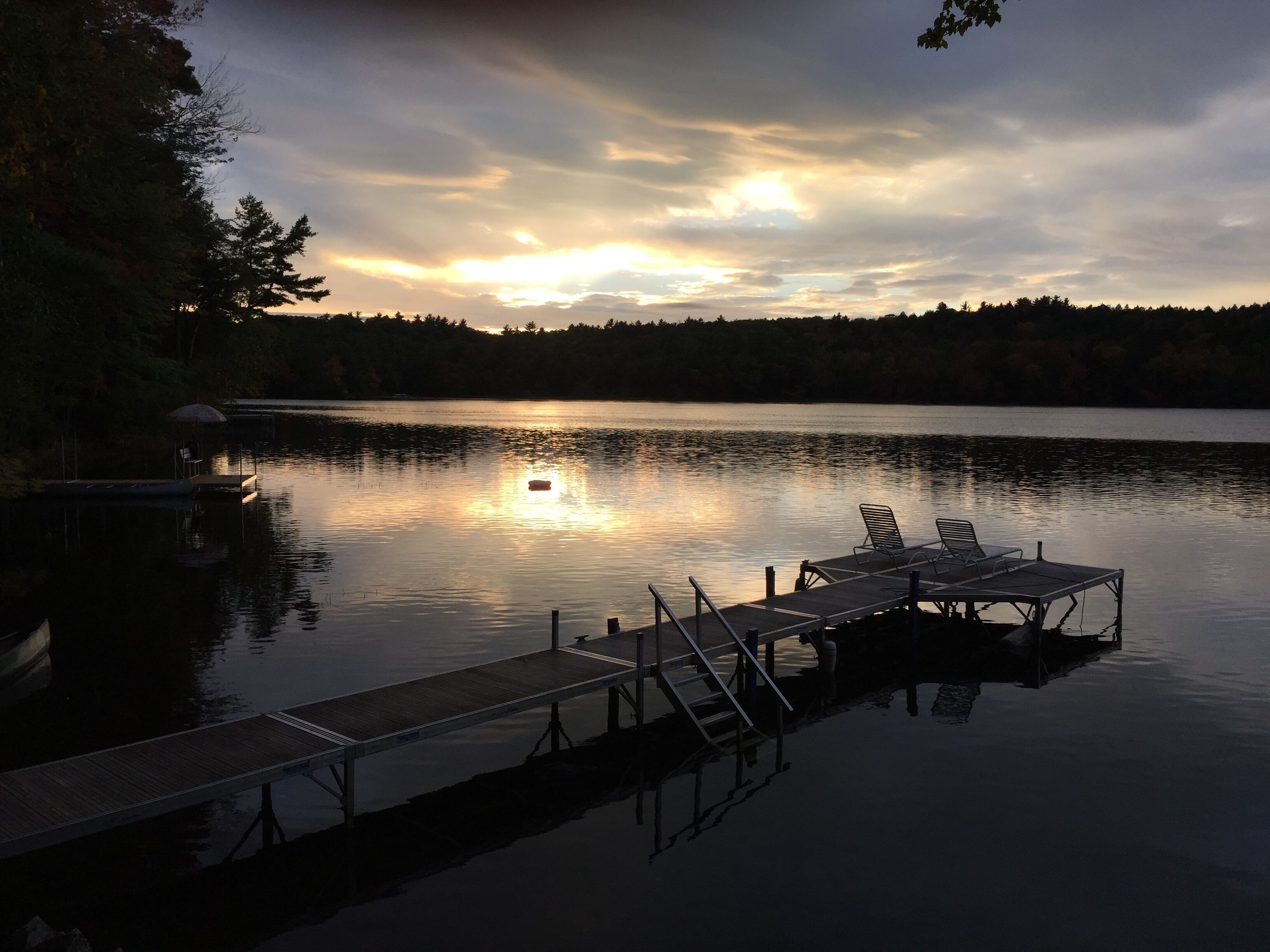 Fall colors at a Maine Lakefront cottage. Watch the beautiful change of seasons