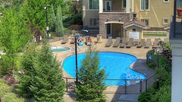 Outdoor pool, a heated pool, sun loungers