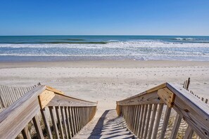 On the beach, sun loungers, beach towels