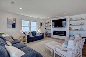 Smart TV, fireplace, ping pong, books