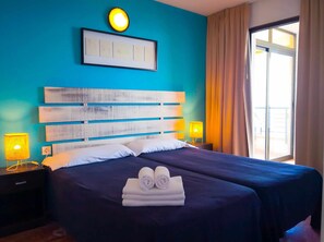 2 slaapkamers, een strijkplank/strijkijzer, reisbedje, gratis wifi