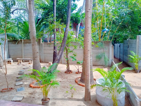 Property grounds - The Well's Serenity Beach house (Beachside Guest house) (TN)