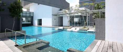Outdoor pool, pool umbrellas, sun loungers