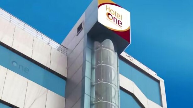 A modern hotel building with a prominent 'Hotel One' sign at the top. - Hotel One DG Khan (Dera Ghazi Khan)