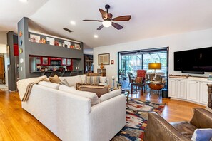 Smart TV, fireplace, books, offices