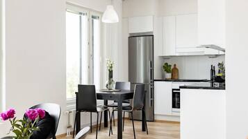 Premium Apartment | Living room | 32-inch LED TV with cable channels, TV, heated floors