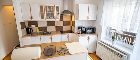 Apartment (One bedroom Apartment 1) | Private kitchen | Fridge