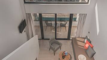 Superior Duplex | Living area | Flat-screen TV