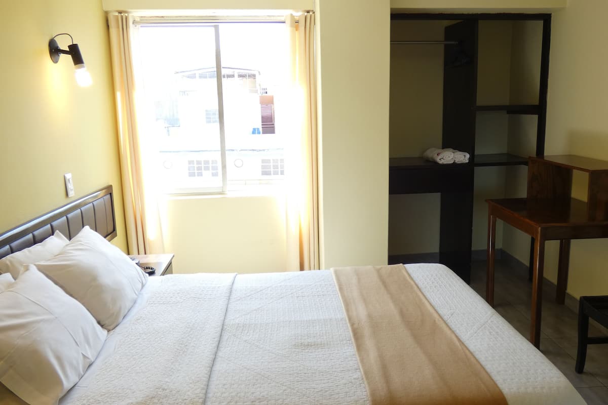 Desk, free WiFi, bed sheets