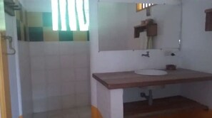 Shower, towels, soap, toilet paper