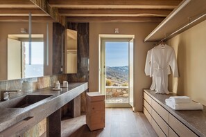 Bathtub, hair dryer, towels, soap