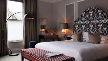 Signature Deluxe Room | In-room safe, blackout drapes, iron/ironing board, free WiFi