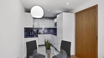 Apartment, 1 Bedroom | Living area | Flat-screen TV