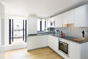 Apartment, 2 Bedrooms | Private kitchen | Fridge, microwave, oven, dishwasher