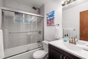 Shower, hair dryer, towels