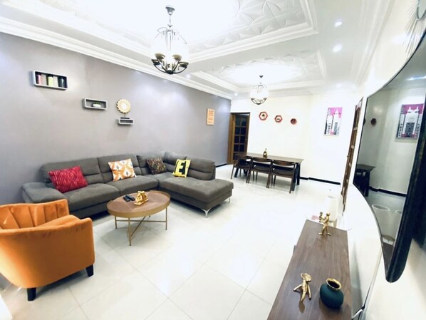Apartment | Living area | 30-inch TV with digital channels - Mam Lovely 3-bed Apartment in Dakar-almadies (Dakar)