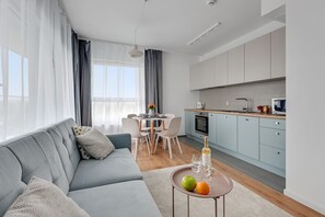 Living room - Baltica Sky by TriApart (Gdansk)