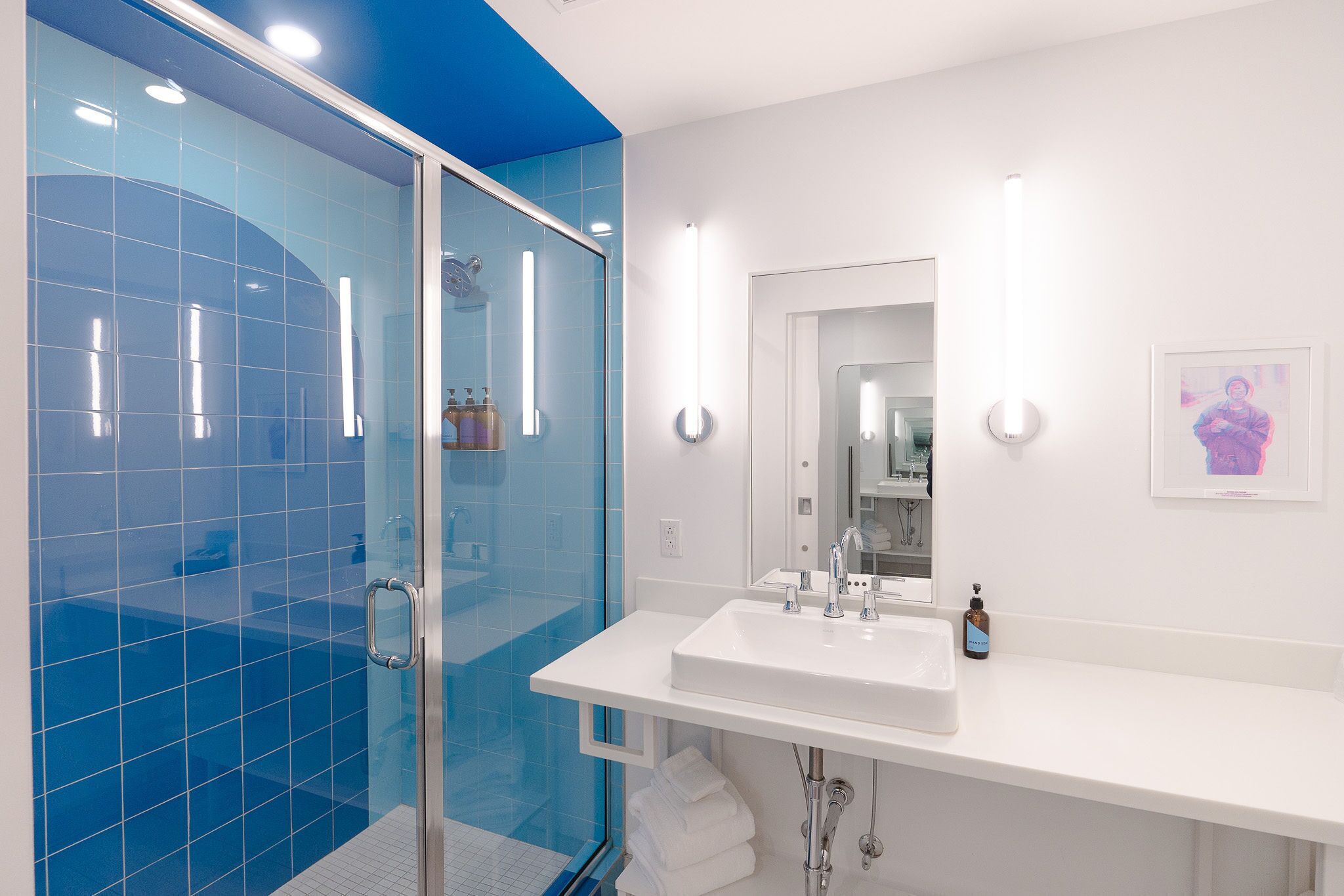 single room | bathroom | hair dryer, towels, soap, shampoo