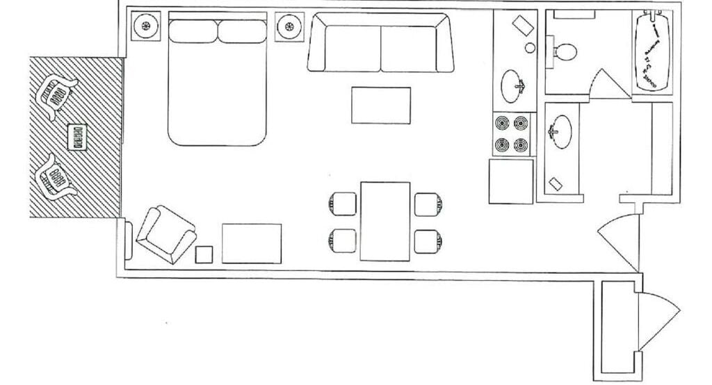 A floor plan of a hotel room with a kitchenette, a dining area, and a bathroom.