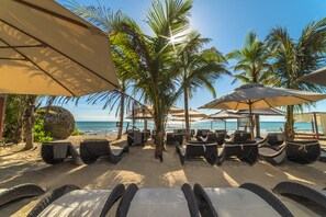 Private beach, white sand, sun-loungers, beach umbrellas