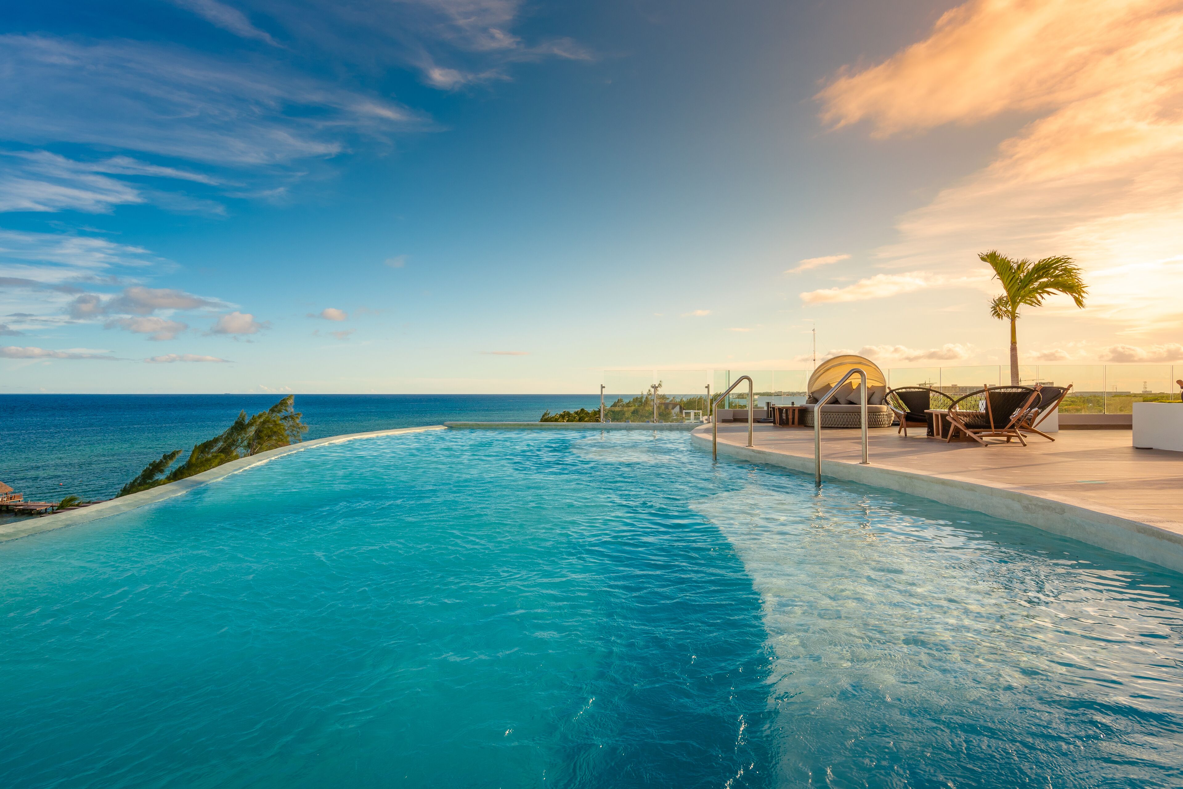 2 outdoor pools, open 7:00 am to 6:00 pm, pool umbrellas, pool loungers