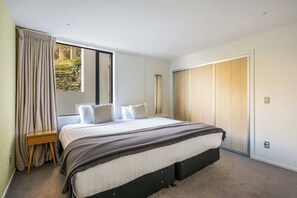 2 bedrooms, premium bedding, iron/ironing board, travel crib