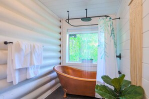 Bathtub, hair dryer, towels